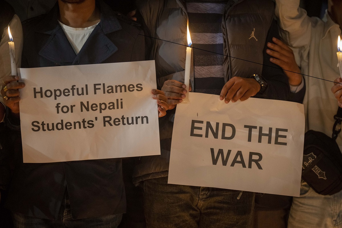 Students-light-candles-in-nepal_israiel-war1-1696864487.jpg