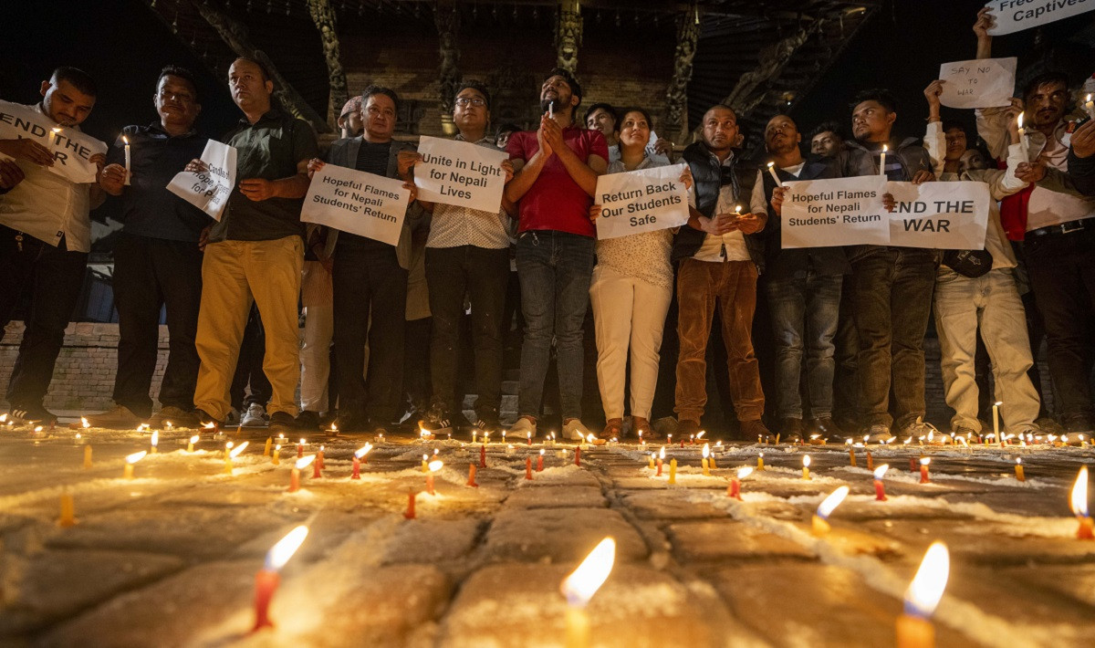 Students-light-candles-in-nepal_israiel-war3-ap-1696864487.jpg
